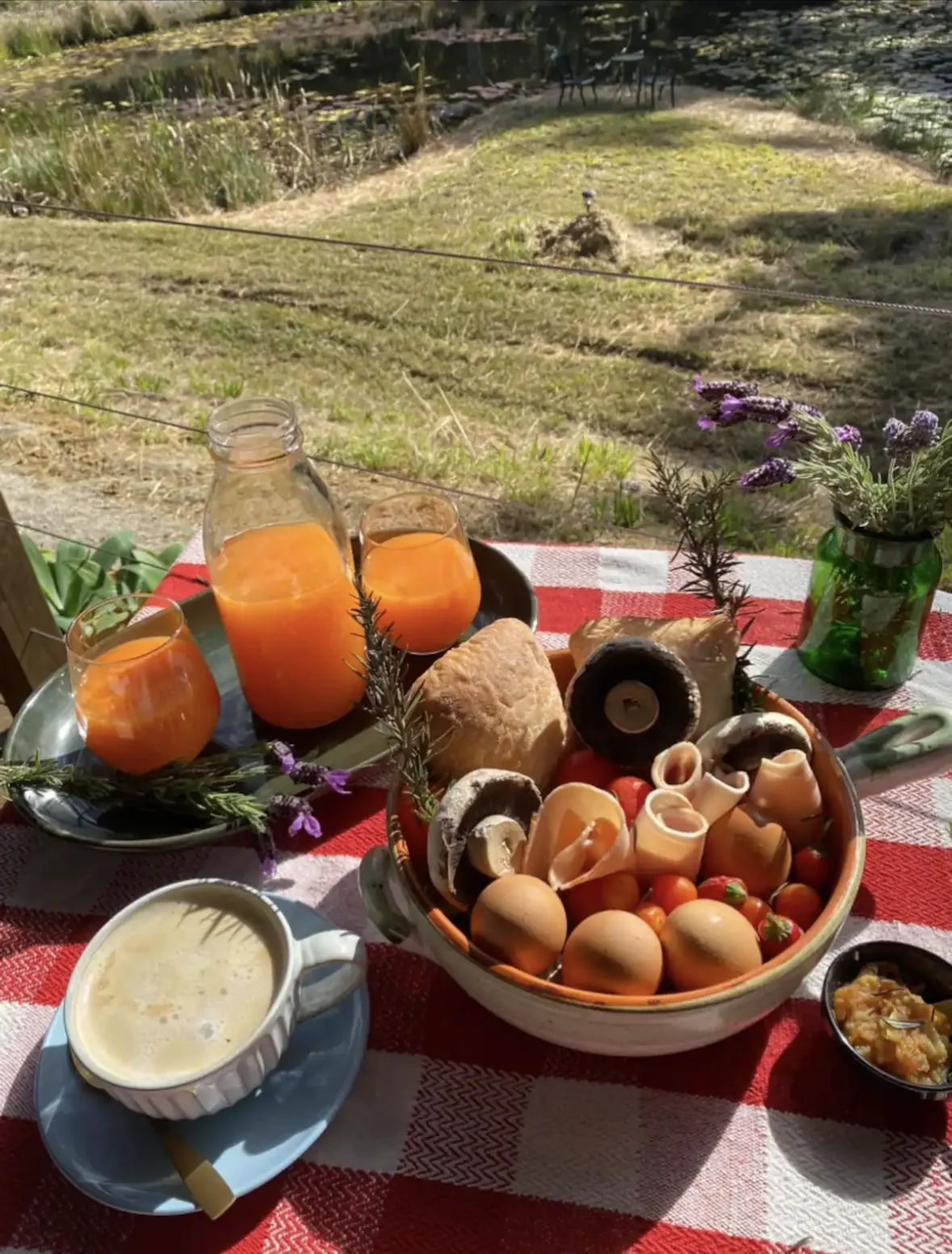 Breakfast hamper with fresh juice, eggs and mushrooms